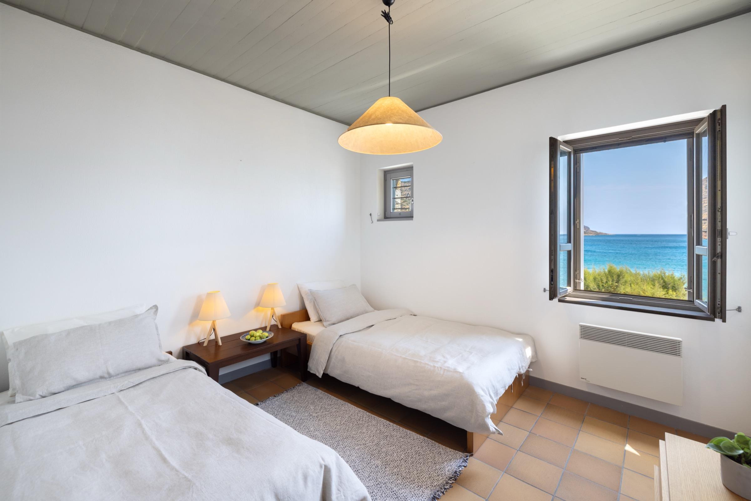 A twin room with two single beds